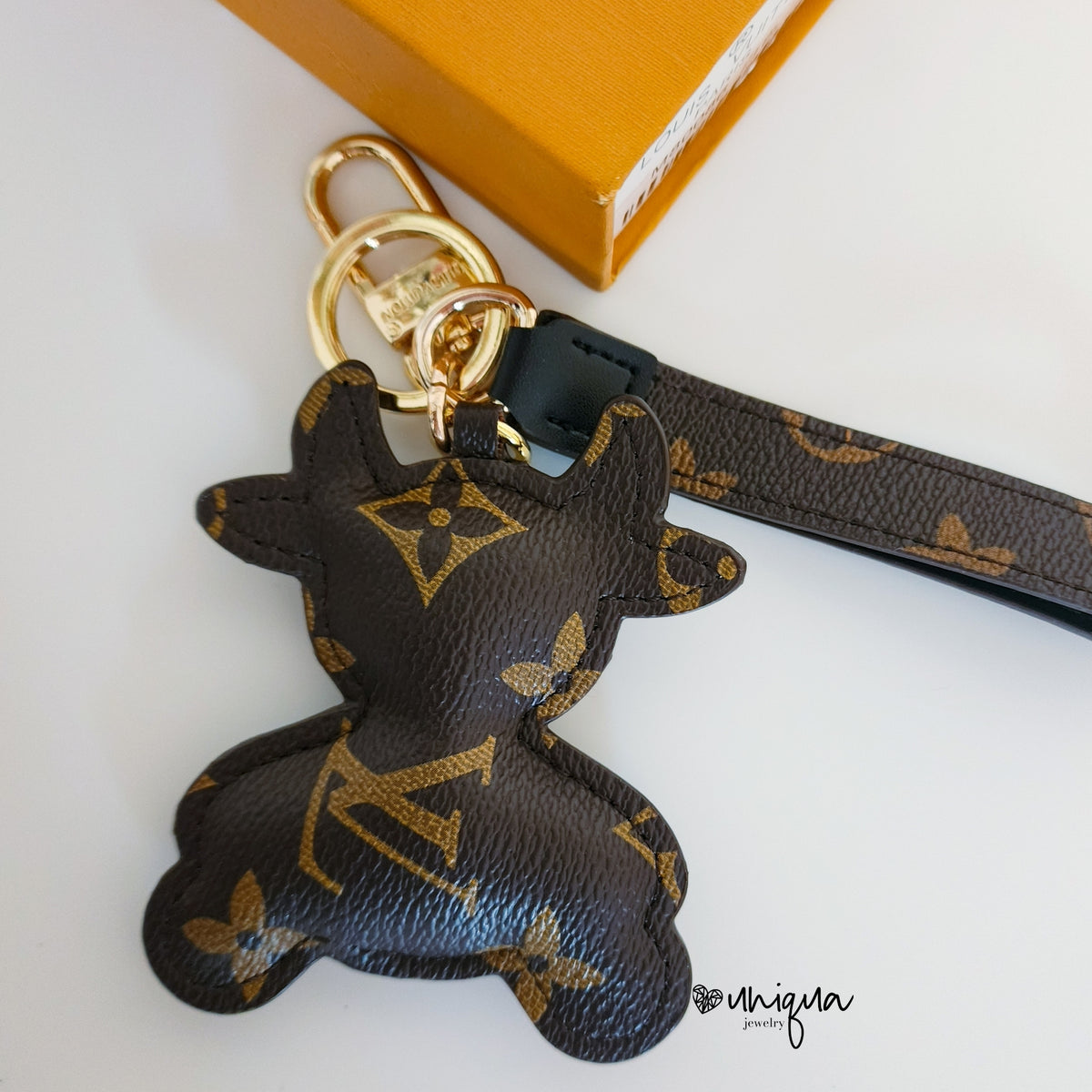 LV COW SHAPE KEYCHAIN – Uniqua Jewelry